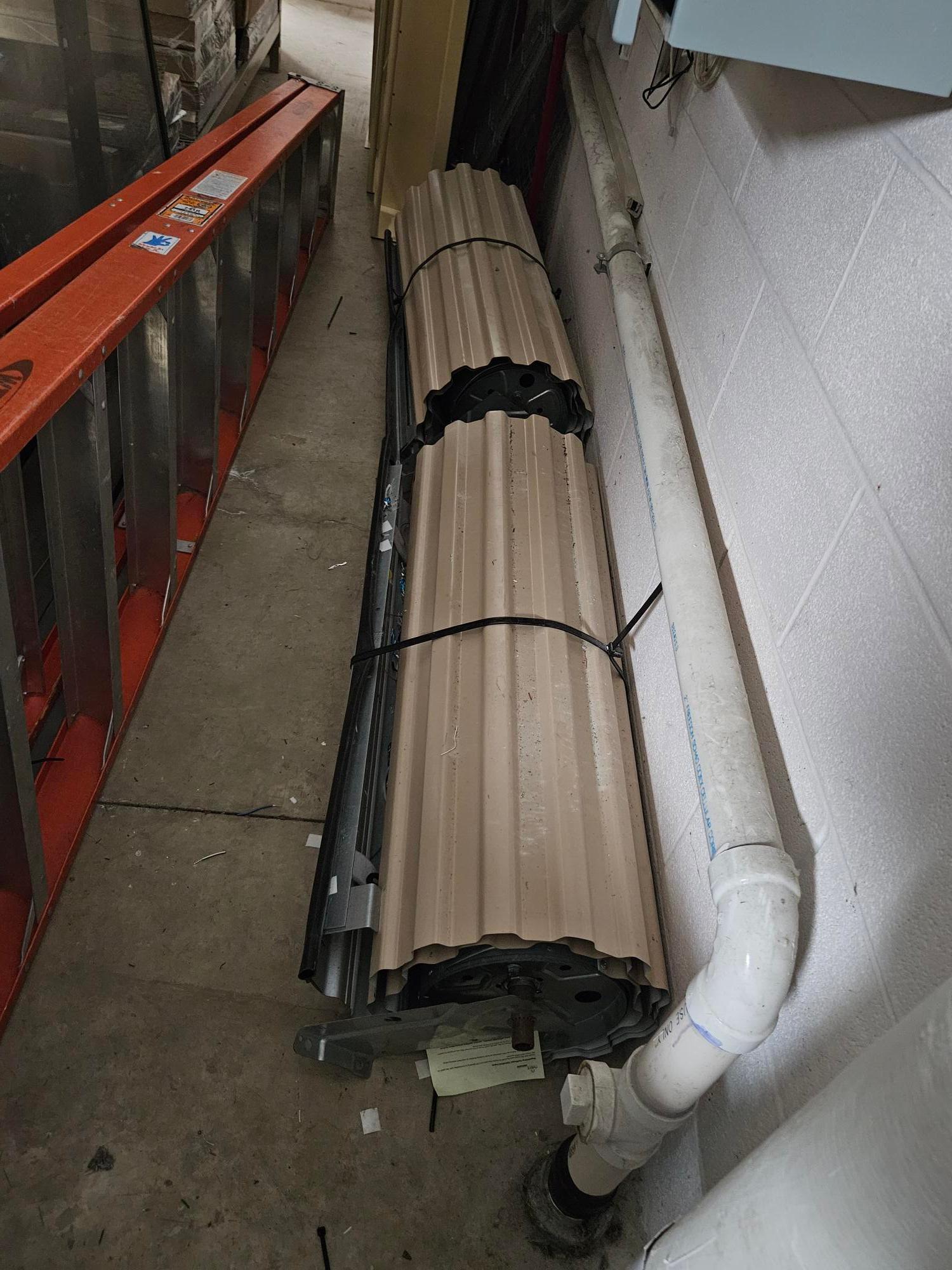 2 Metal roll down doors Reaching Across Illinois Library System